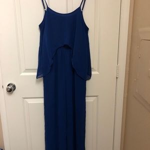 Strappy open back ruffled wide leg jumpsuit.